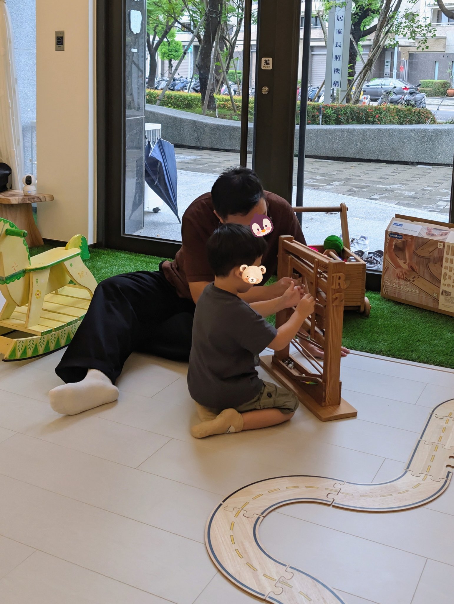 play with me moment father son co play marble run cause and effect visual tracking hand eye coordination early
