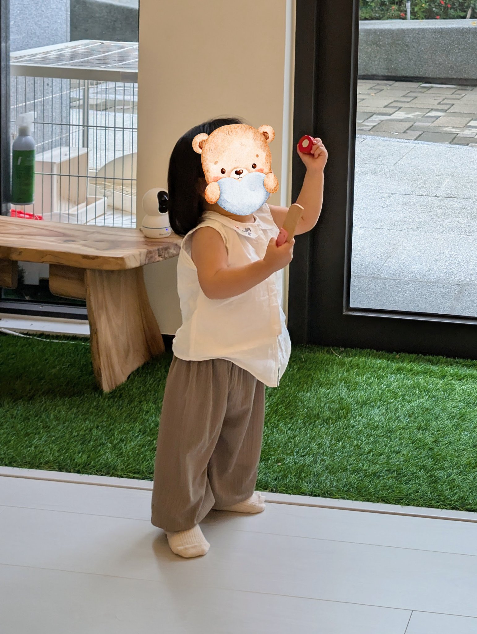 play with me moment toddler standing large glass doors nature observation wooden play food independent play lounge